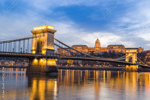 Dusk at bridge on Danube river with lights, Budapest city Hungary.
