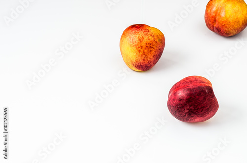 Nectarine friuts isolated on white background.