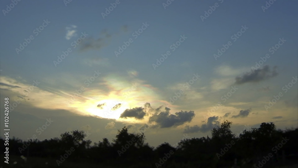 Sunset in tropical countryside.