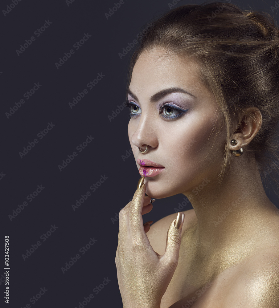 Beautiful girl gold jewelry hi-res stock photography and images