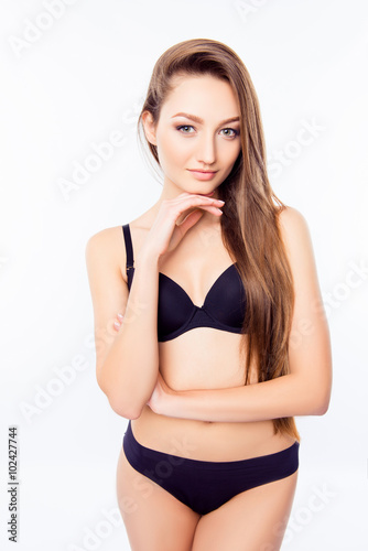 Sexy cute girl in black lingerie  on a white background