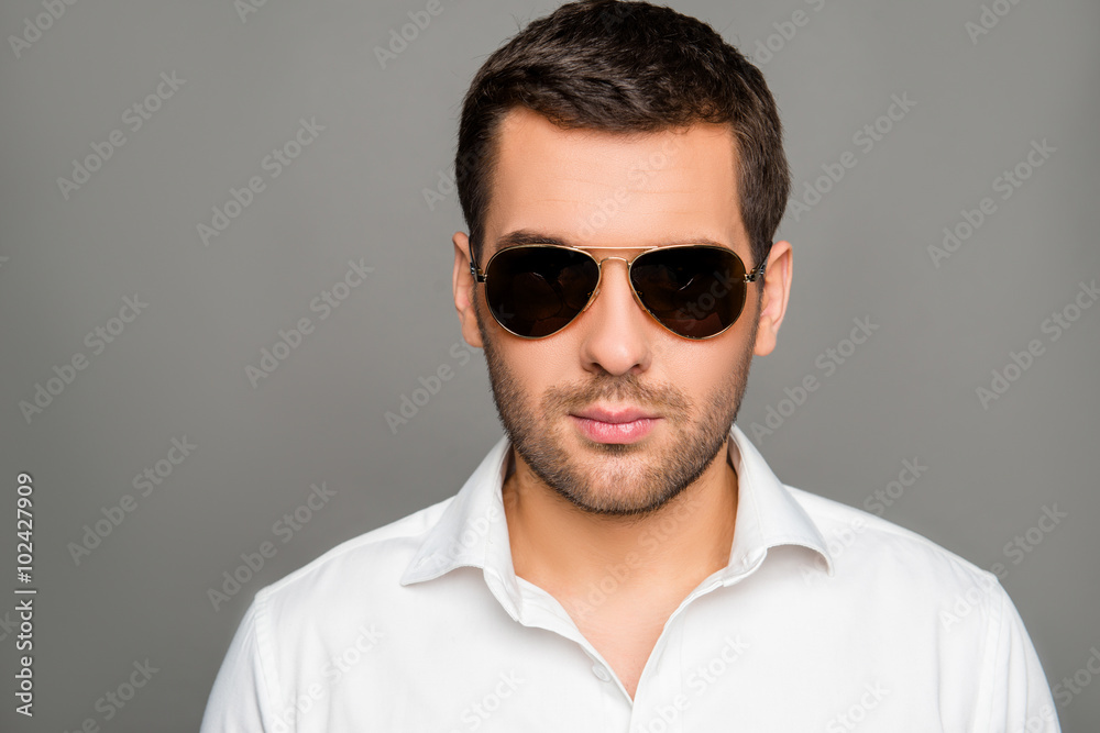 Portrait of serious young man i n spectacles Portrait of serious young man i n spectacles