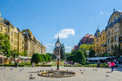 Fotografie Victory square - piata victoriei - timisoara is a long square with green park surrounded by national opera on one side and the metropolitan cathedral on the other