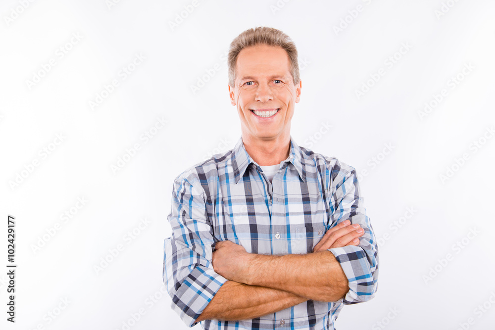 Handsome happy aged man crossing hands Handsome happy aged man crossing hands