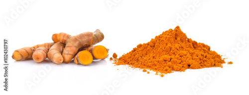 turmeric powder with turmeric root isolated on white