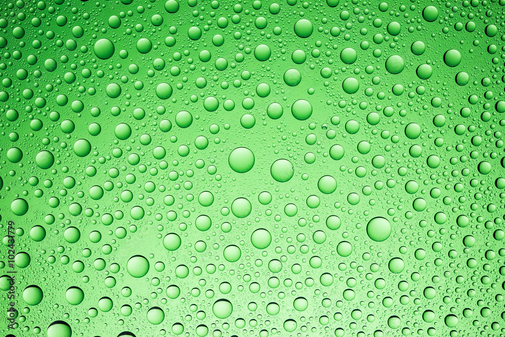 Green water drops background.