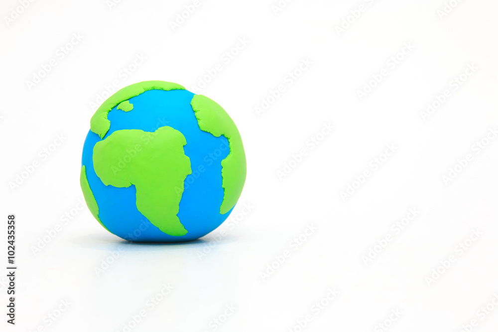 Globe ,earth made from clay on white background with copy space. Concept Save green planet. Globe ,earth made from clay on white background with copy space. Concept Save green planet.