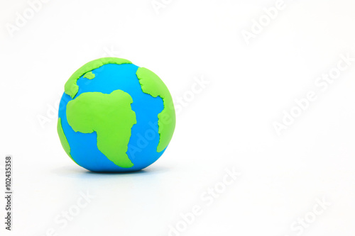 Globe ,earth made from clay on white background with copy space. Concept Save green planet.