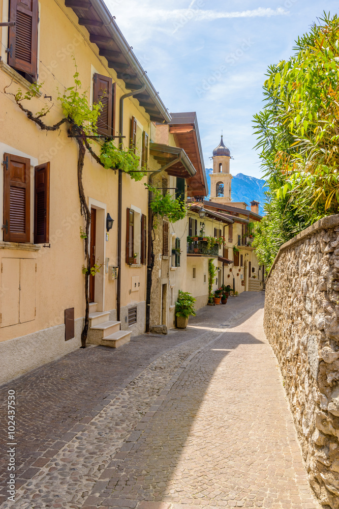 Fototapeta premium Picturesque small town street view in Limone, Lake Garda Italy.