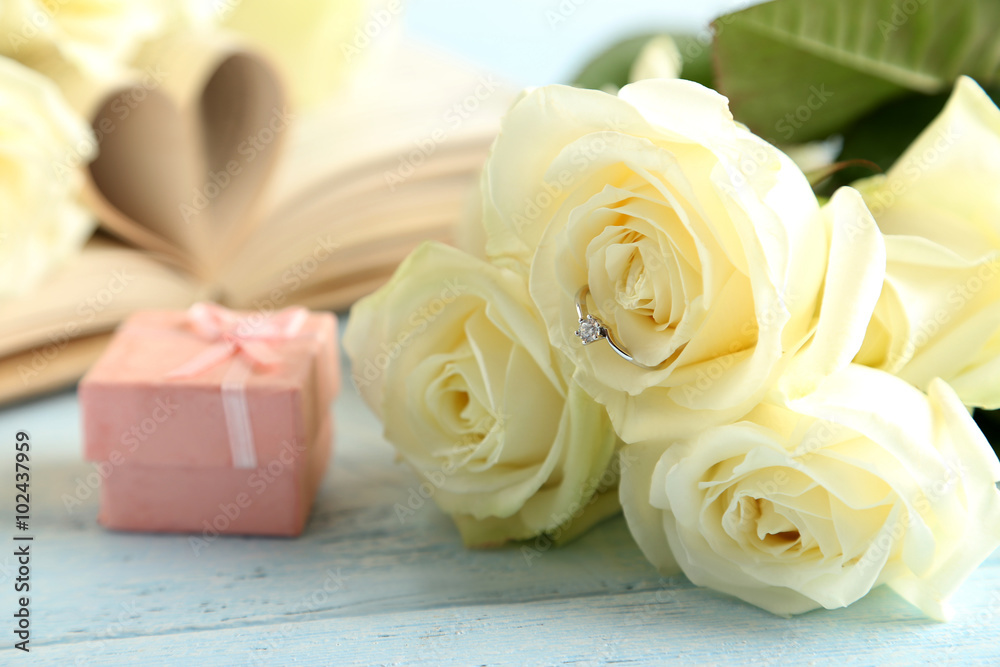 Bouquet of white roses on blue wooden background Bouquet of white roses on blue wooden background