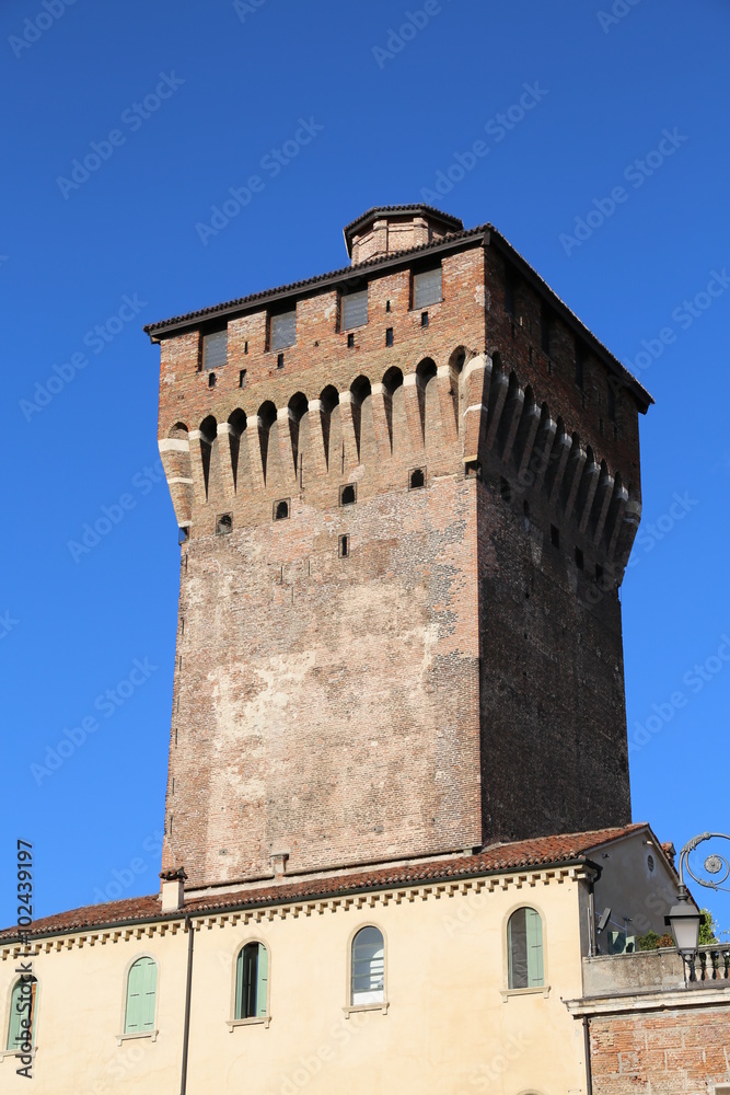 red brick medieval tower in the historic Italian city