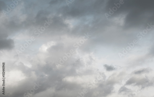 Beautiful light blue sky with white and gray clouds