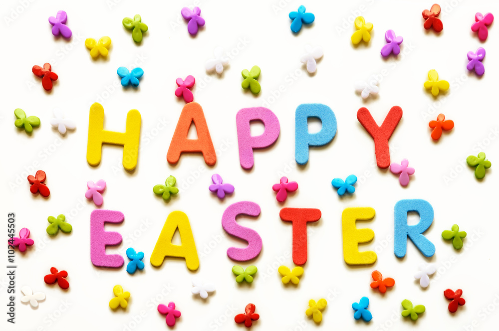 Text of colorful letters Happy Easter on the background of multicolored butterflies. Isolated