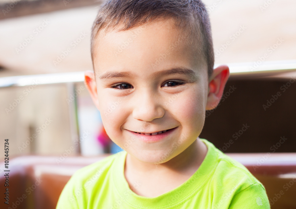 cute boy smiling at outdoor