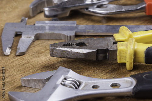 group of tools on wooden background