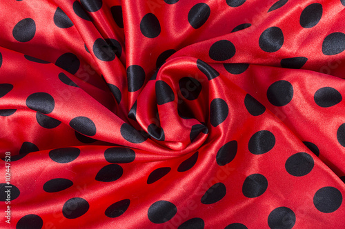 black and red polka dot satin fabric background
