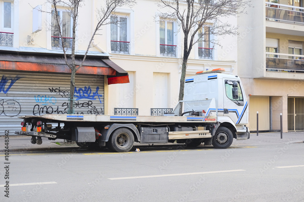 Paris, France, February 7 , 2016: wrecker on a parking in Paris, France