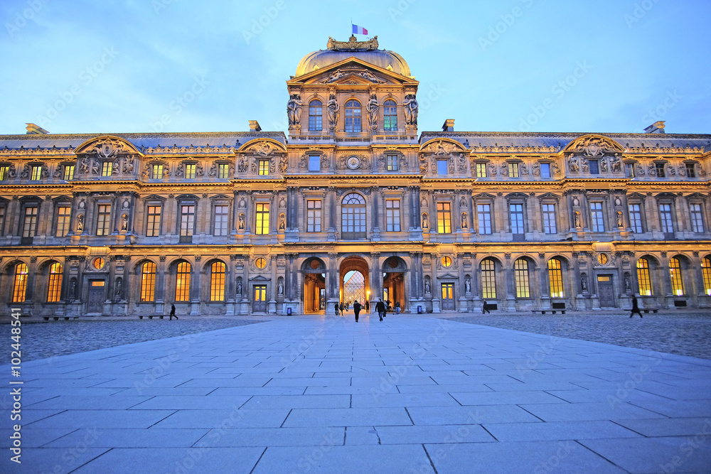 Paris, France, February 6, 2016: exterior of Louvre, the well-known residence of the French kings, nowadays - one of the largest museums of the fine arts in the world, Paris, France