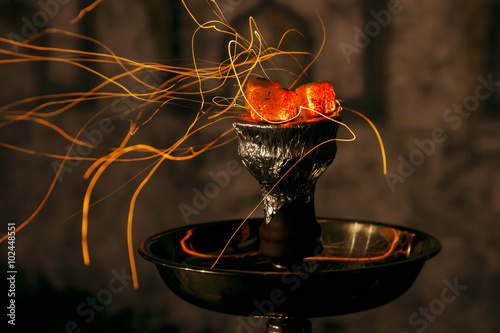 Vászonkép shisha hookah red hot coals. Sparks from breathe
