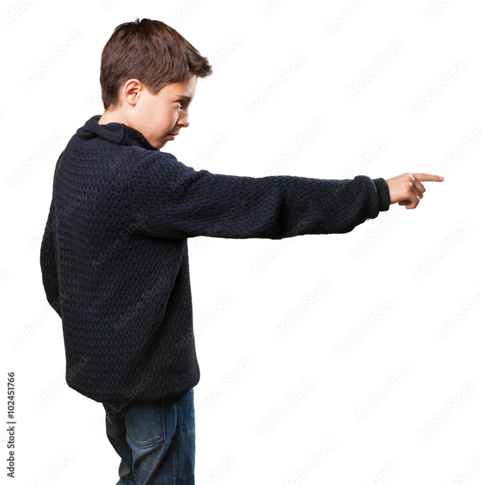 little boy pointing to the copy space