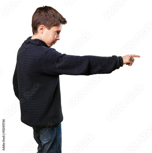 little boy pointing to the copy space