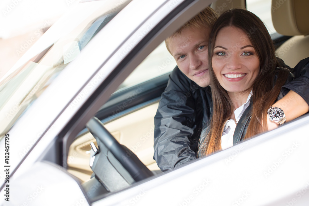 couple in the new car