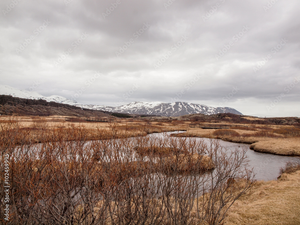 Little lake somewhere in iceland, in the background some snowy mountains.
Photo taken on: May 13th, 2015