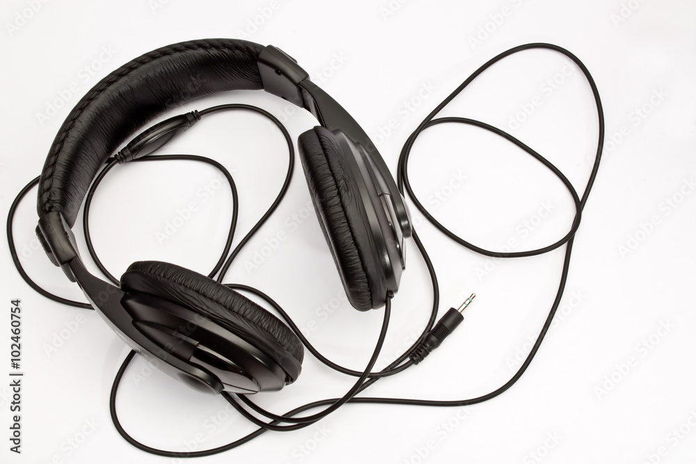 Black headphones on white background Black headphones on white background