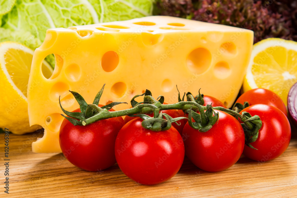 yellow cheese with fresh vegetables yellow cheese with fresh vegetables