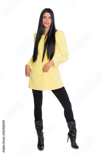 Young slim elegant woman in a full-length