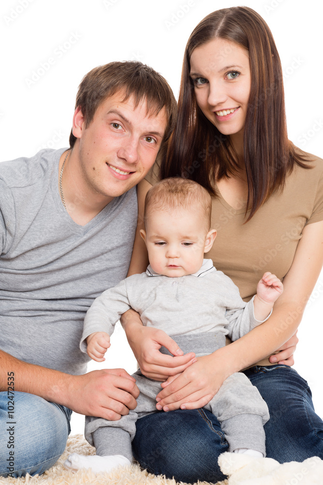 Portrait of young parents with little boy Portrait of young parents with little boy