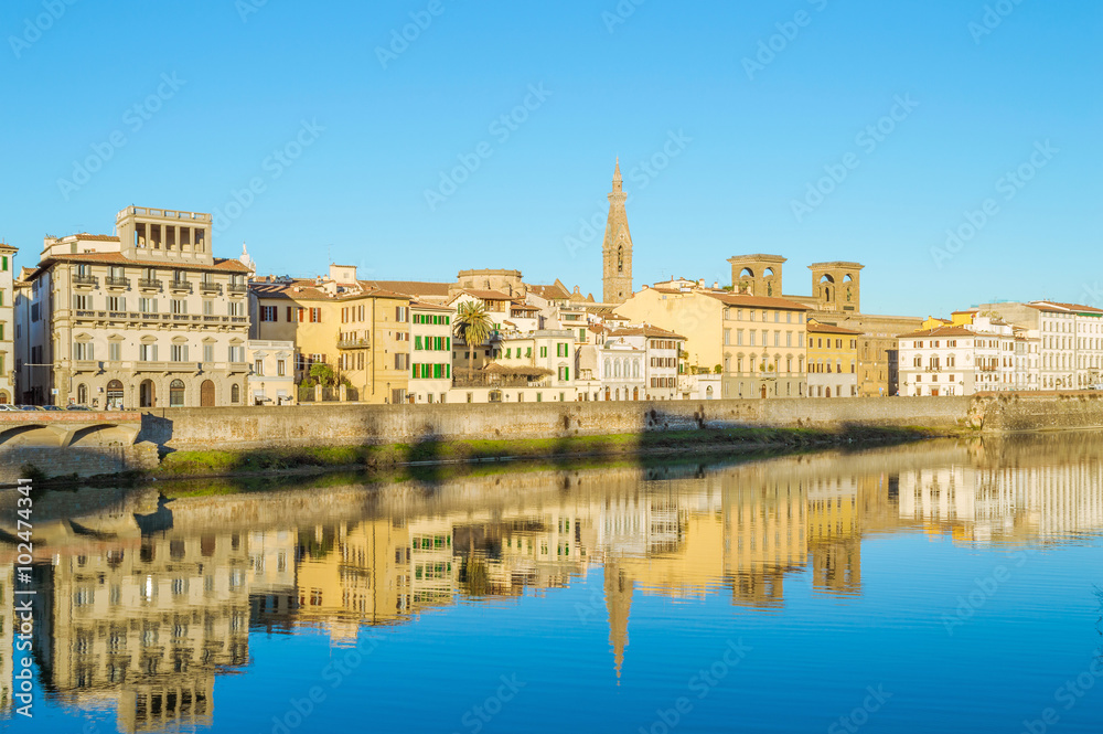Florence  - palaces on the bank of the river Arno, with water re