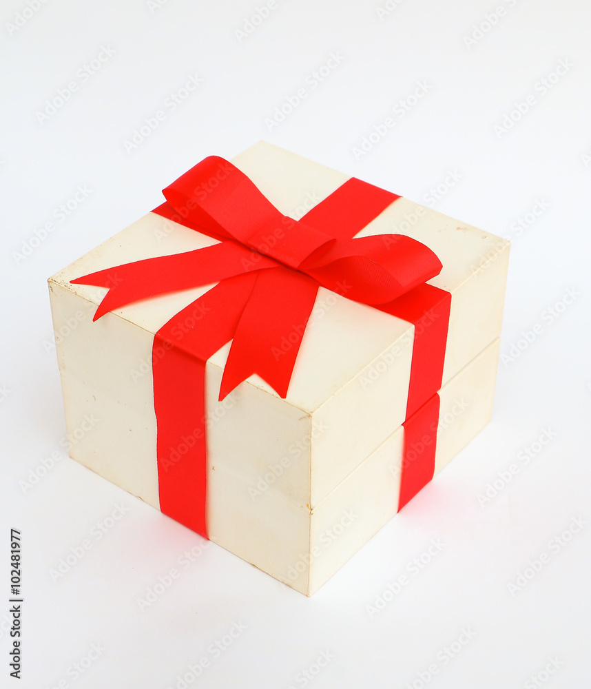 Obraz premium Red bow gift on white background.