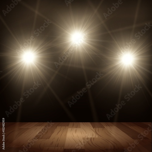 Bright lights in show performance with wood floor