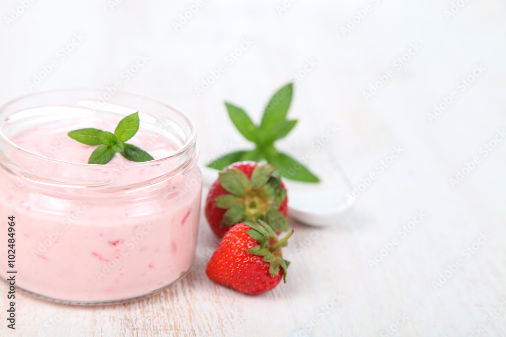 Strawberry yogurt and ripe strawberry