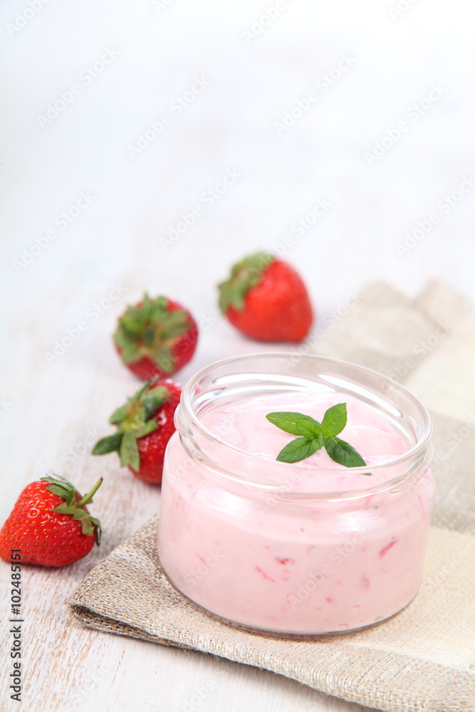 Strawberry yogurt and ripe strawberry Strawberry yogurt and ripe strawberry