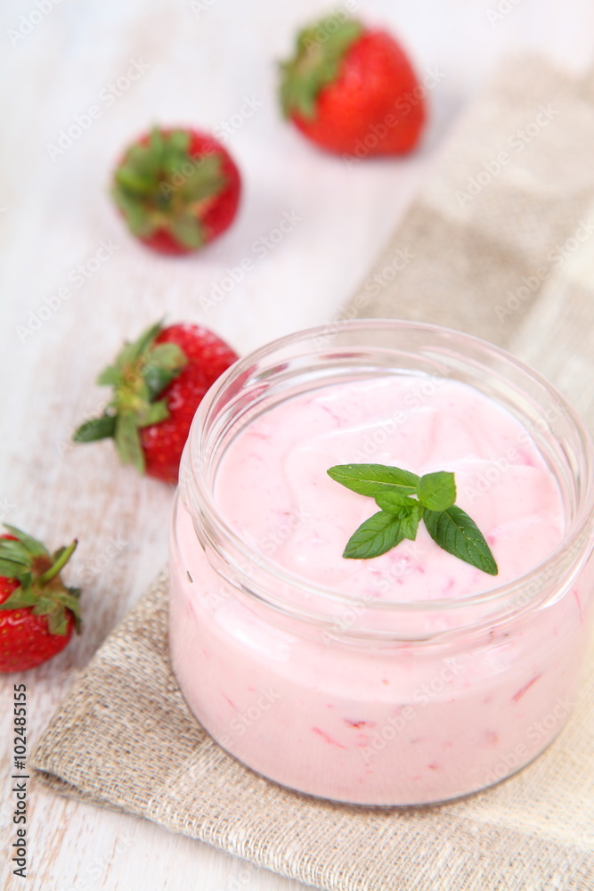 Strawberry yogurt and ripe strawberry Strawberry yogurt and ripe strawberry