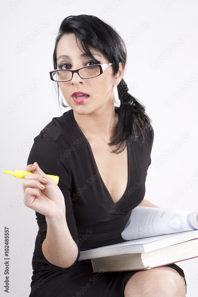 Pretty Student Holding Book and Highlighter