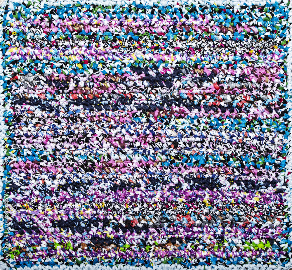 Fototapeta premium Natural crocheted rug colorful striped background