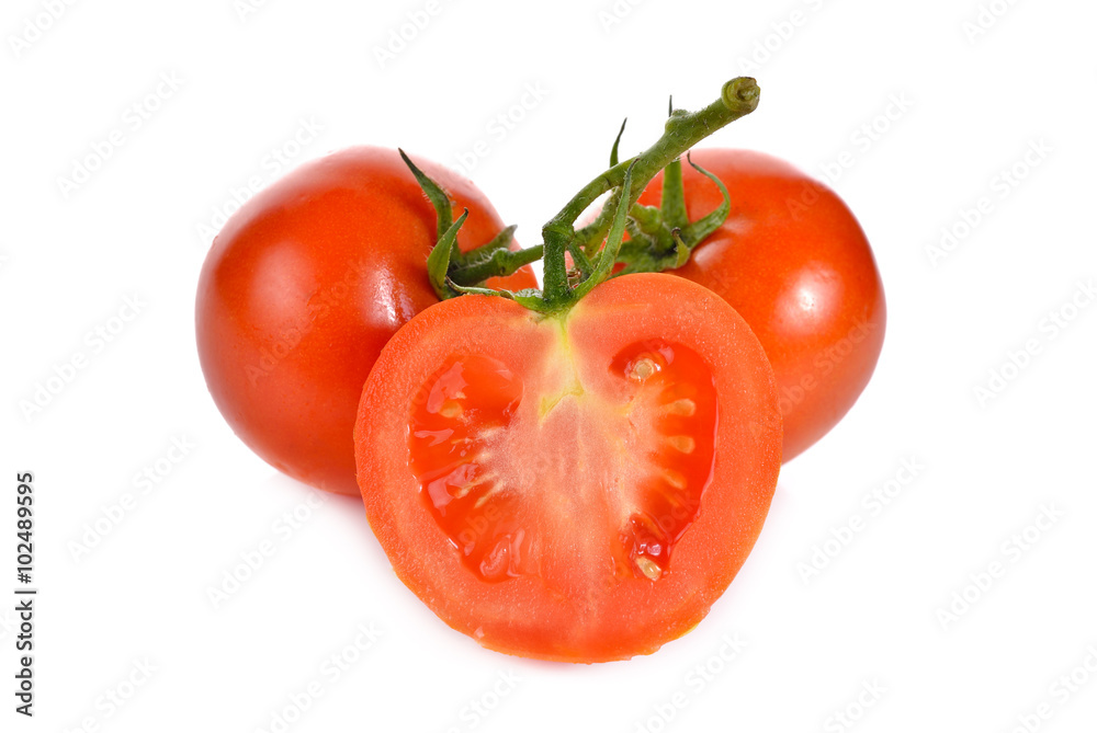 whole and half cut tomato with stem on white background whole and half cut tomato with stem on white background