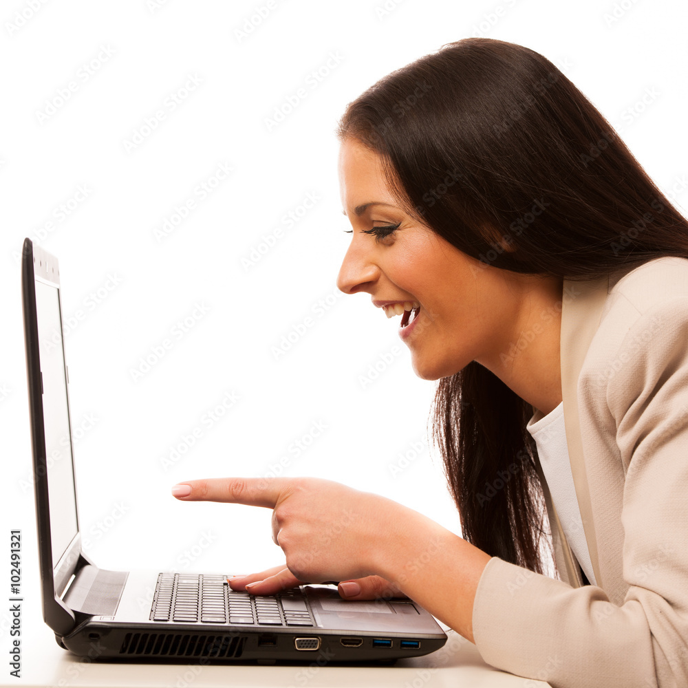 Excited woman looking into laptop computer. Excited woman looking into laptop computer.