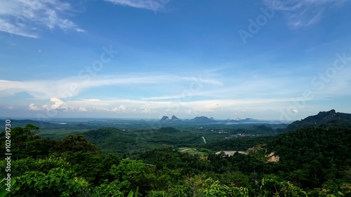 Timelapse of moving clouds over Wang Kelian hill at Perlis, Malaysia. photo