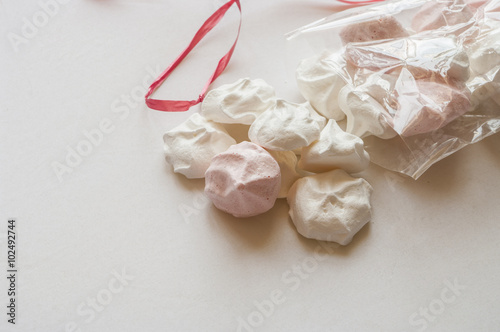 French meringue cookies on white background