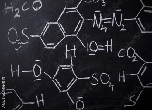 Chemical formula on blackboard - handwritten