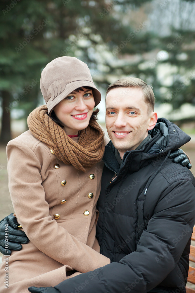 couple in park in autumn. couple in park in autumn.