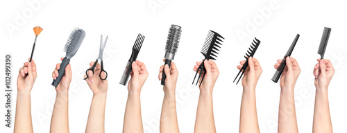 collection of hands holding tools for hair salon isolated on whi