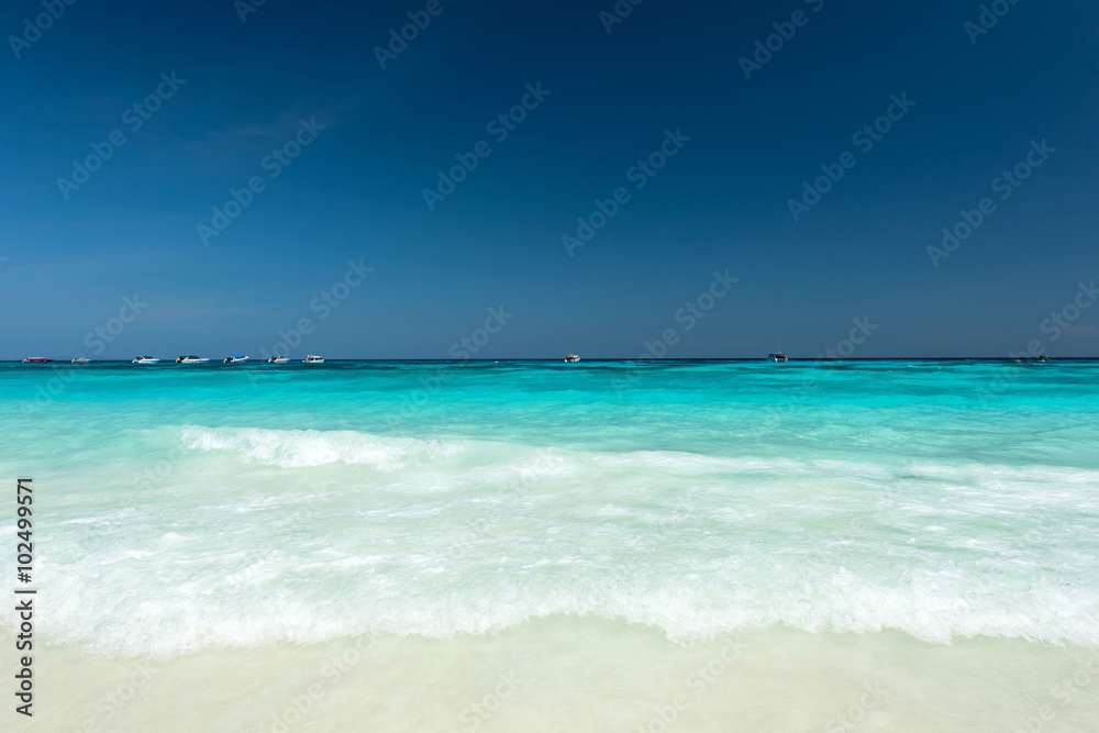 Refreshing water splash at the tropical beach , Located Ta Cai Island,Thailand Refreshing water splash at the tropical beach , Located Ta Cai Island,Thailand