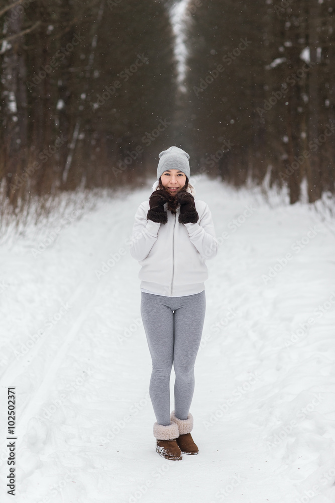 woman running around in the woods