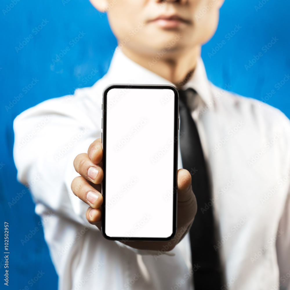 Businessman holding smartphone Businessman holding smartphone