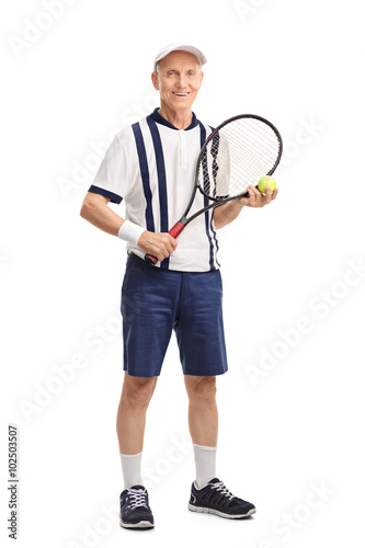 Senior man holding a racket and a tennis ball © Ljupco Smokovski